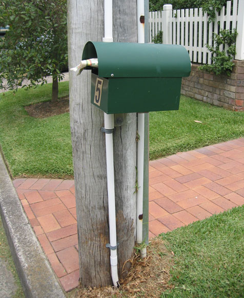 longueville-mailbox-power-pole-um.jpg